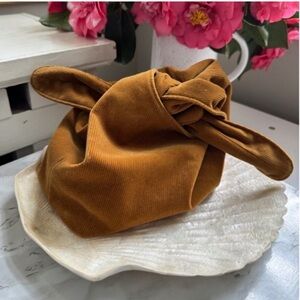 Merit Beauty signature corduroy bag